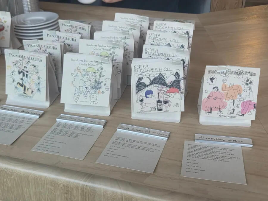 Packaged coffee beans sold at the café. The design is simple but charming, making it a good gift option