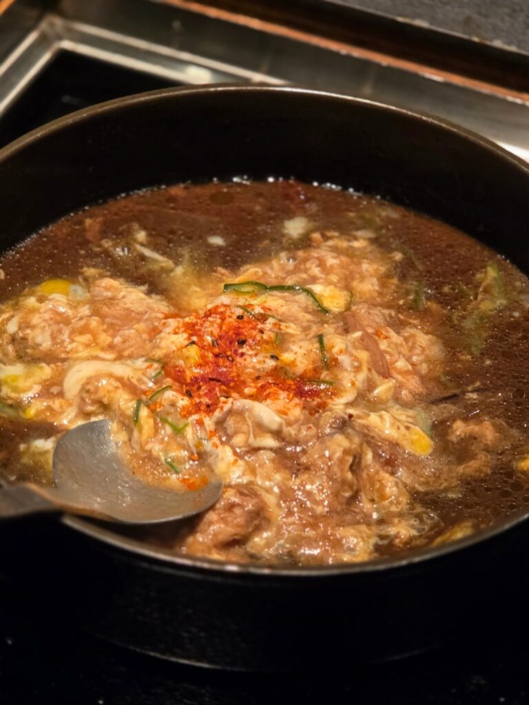 Soft scrambled egg donburi served as the finishing course in the original sukiyaki lunch set at Negi Sukiyaki Seoul