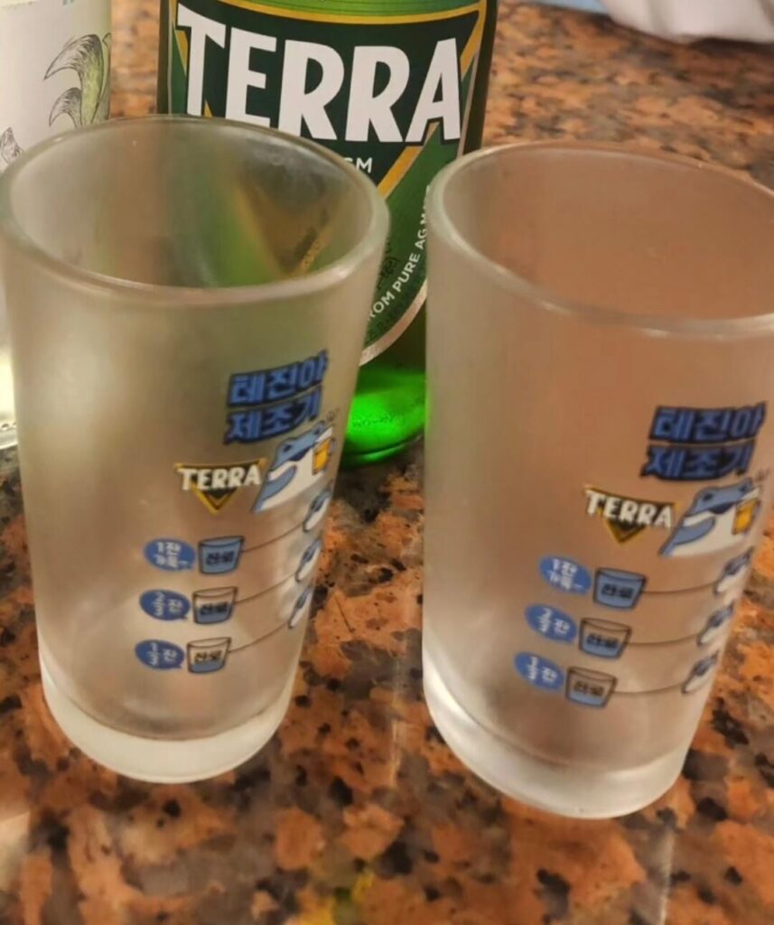 Soju and beer at Okgyeongine Dried Fish, a popular daytime drinking spot inside Sindang Market Seoul