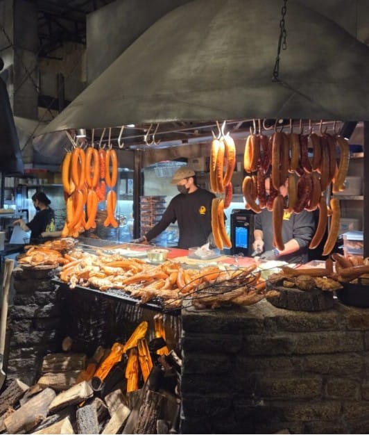 Homemade sausage grilled at Dalmai Square BBQ, an outdoor barbecue spot in Seoul