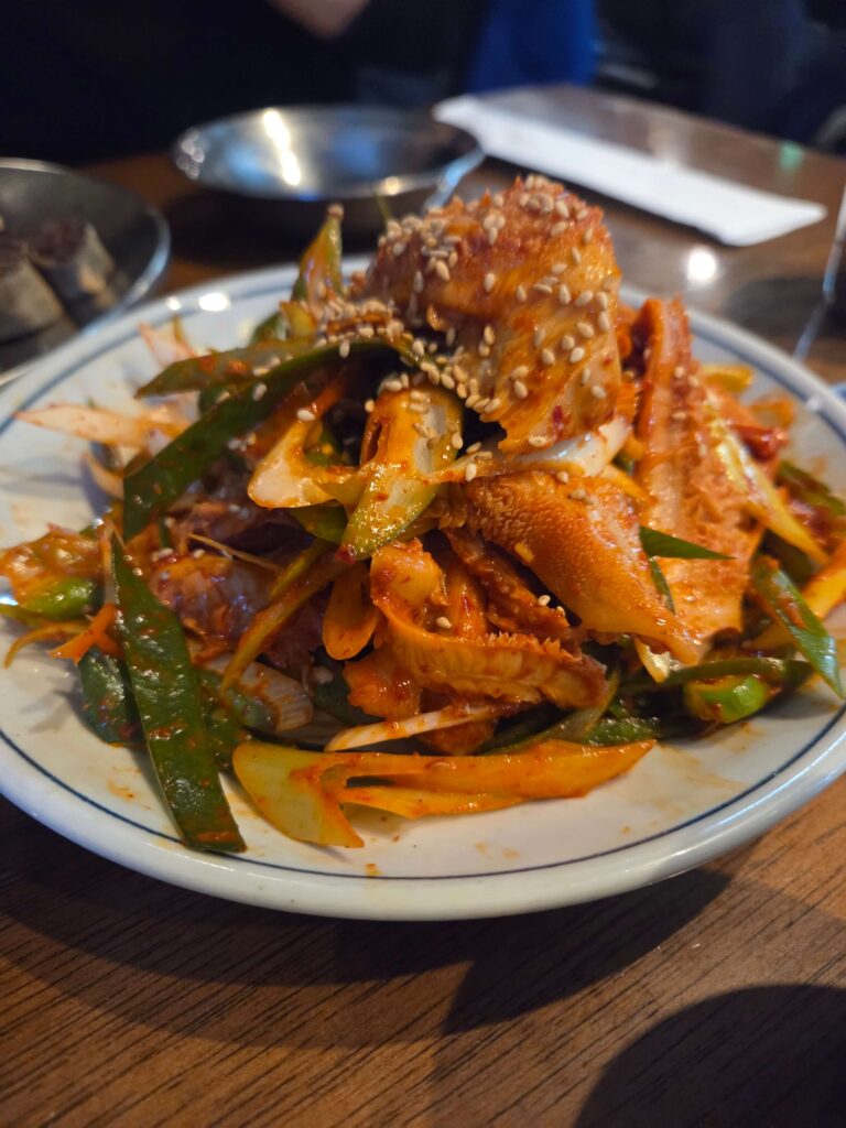 Seasoned beef tripe (Yang-muchim) with fresh vegetables and a tangy spicy dressing
