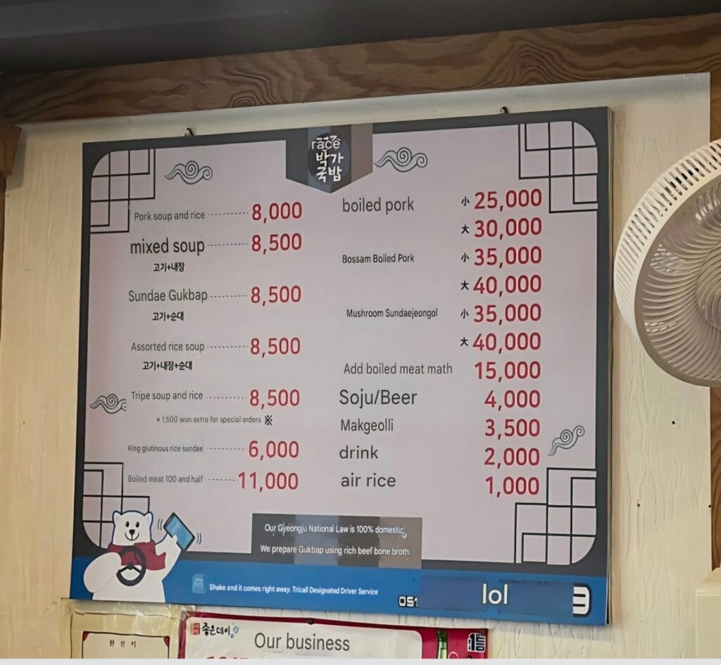 Menu at Gyeongju Bakga Gukbap Seomyeon showing gukbap, blood sausage, boiled pork