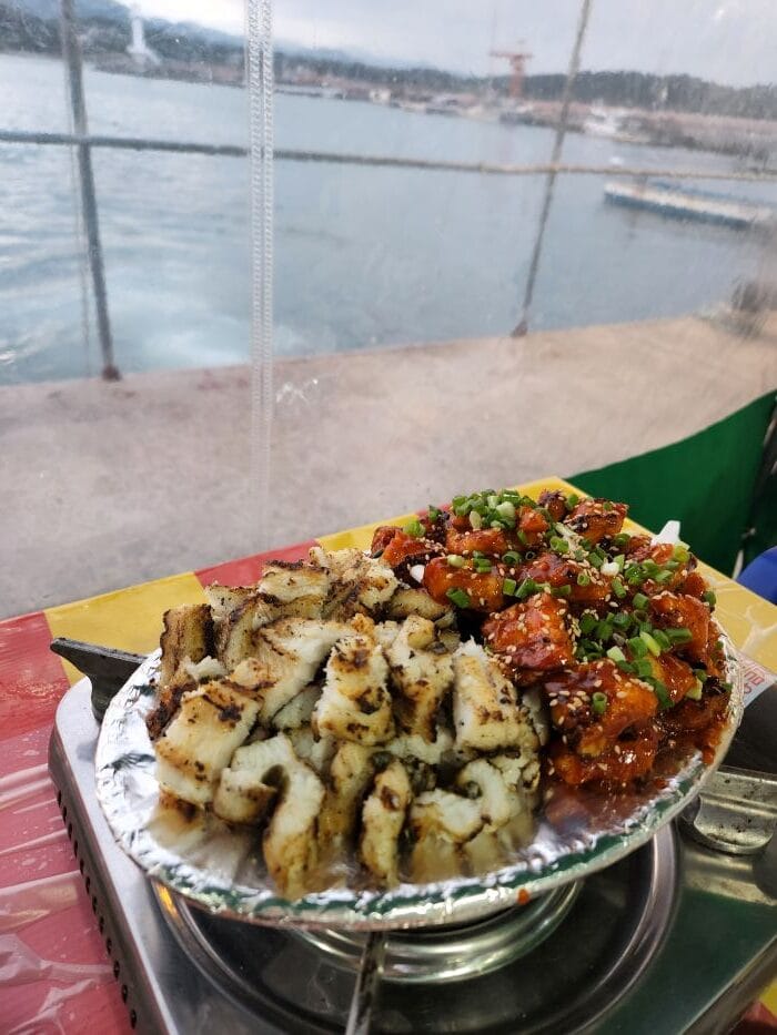 grilled eel at Hakri Breakwater showing the thick, meaty flesh with charred smokiness