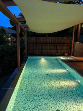 You can enjoy a night swim in your own private pool with a glass of wine