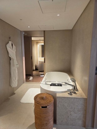 A separate bathtub, shower booth, and toilet for added convenience