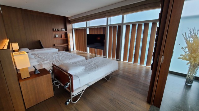 The spacious bedroom at Park Hyatt Busan can also accommodate four people for sleeping