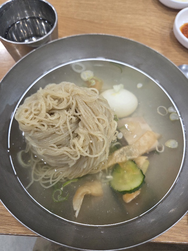 Three-step guide to properly enjoying Mul Naengmyeon at Jinmi Pyeongyang Naengmyeon