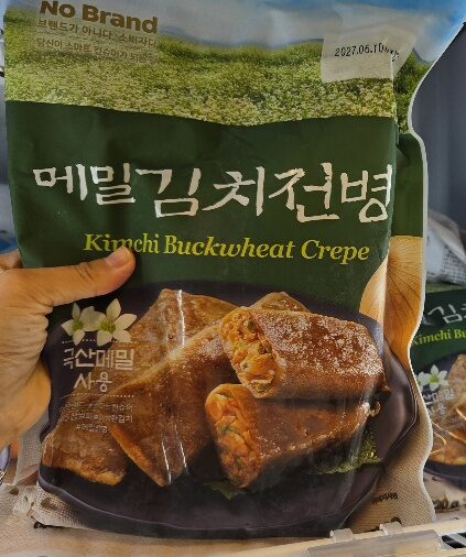 Emart No Brand buckwheat crepe filled with kimchi, ready to pan-fry or microwave.