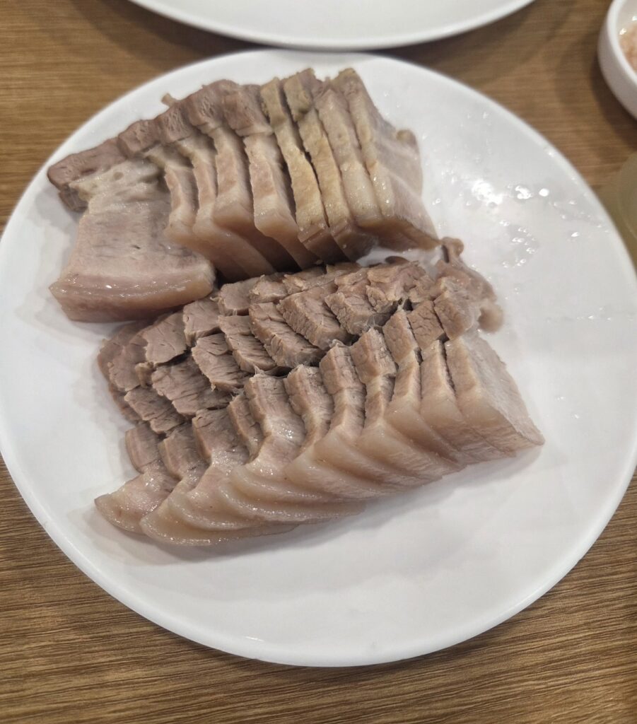 Tender boiled pork slice dish Jeyuk served at Jinmi Pyeongyang Naengmyeon